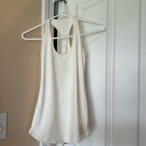 #13 Lululemon size 2 off white tank top with ruffles